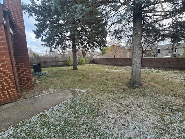 view of yard with central AC unit