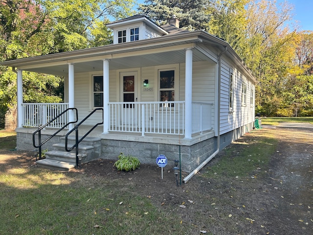 bungalow-style home featuring a porch