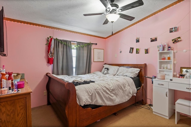 bedroom featuring ceiling fan, ornamental molding, light carpet, and a textured ceiling