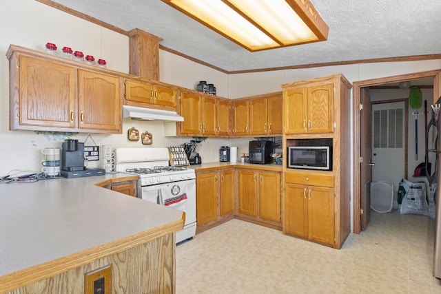 kitchen featuring crown molding, vaulted ceiling, a textured ceiling, and white range with gas stovetop