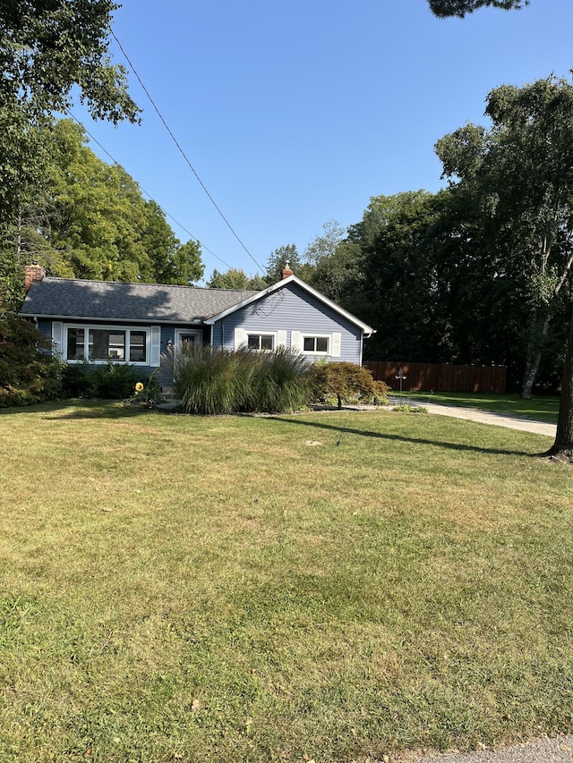 exterior space with a front yard