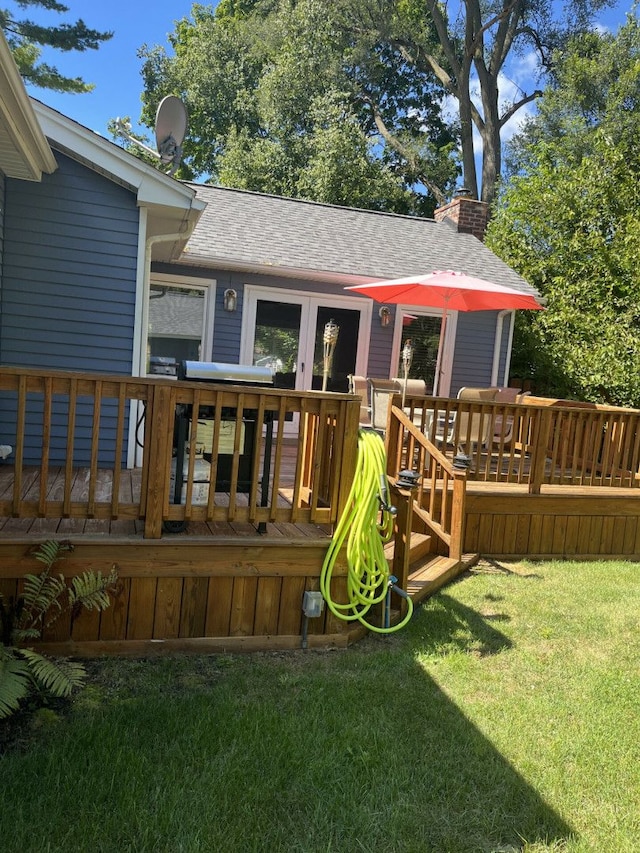 exterior space featuring a yard and a deck