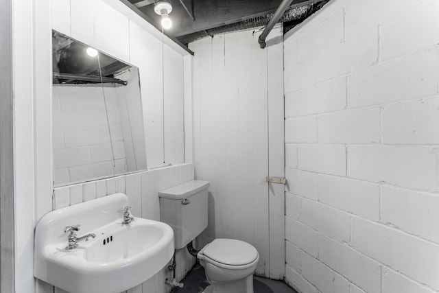 bathroom with sink and toilet