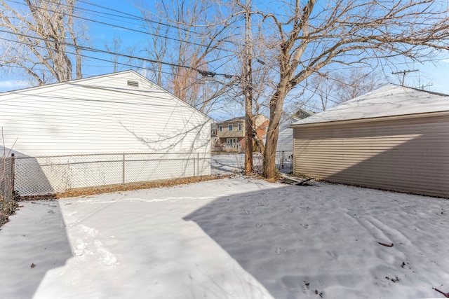 view of yard covered in snow