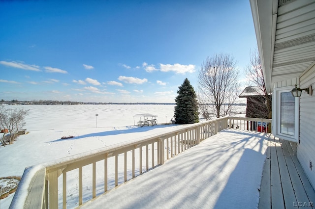 view of snow covered deck