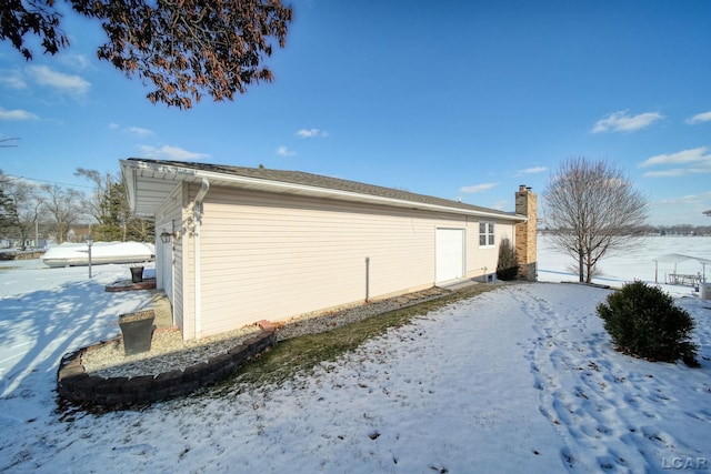 view of snow covered property