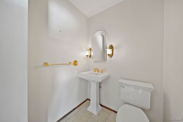 bathroom featuring tile patterned floors and toilet