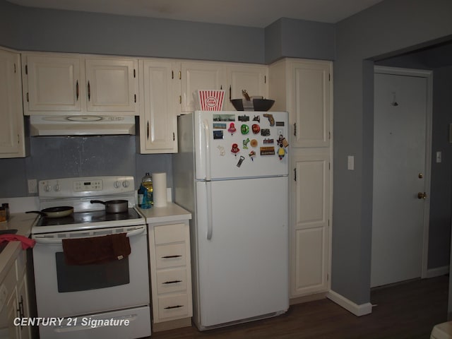 kitchen with white cabinetry, dark hardwood / wood-style floors, and white appliances