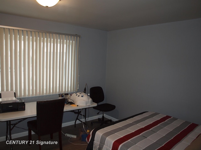 bedroom featuring hardwood / wood-style floors