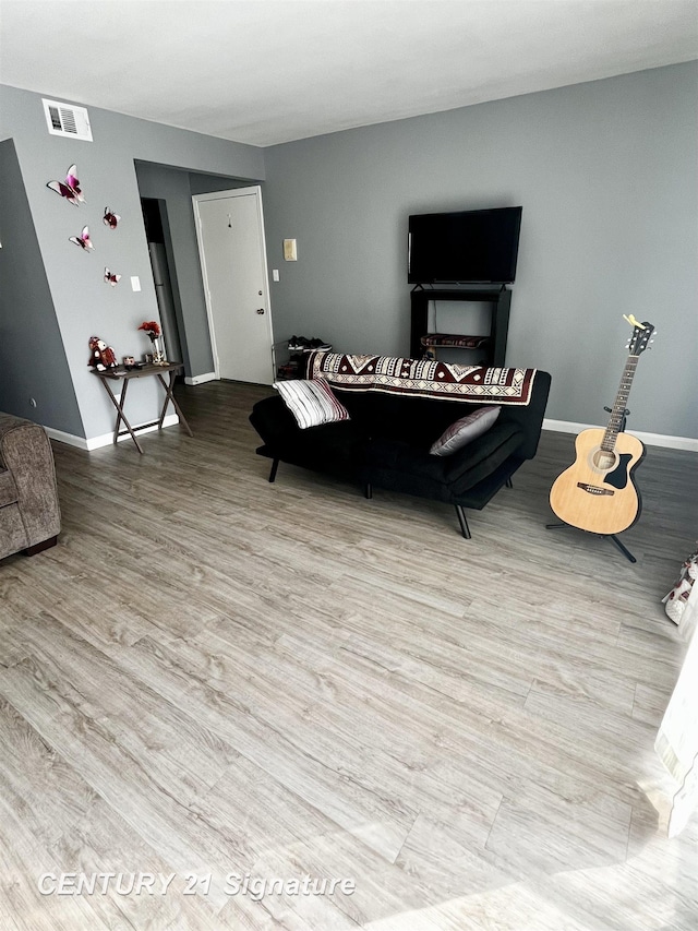 living room featuring light hardwood / wood-style floors