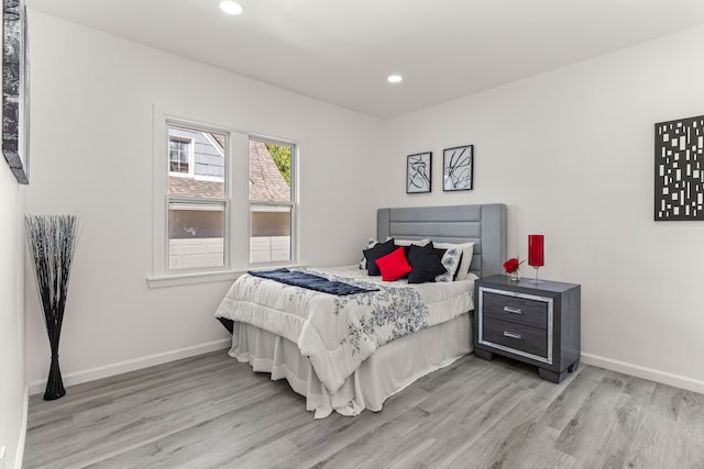 bedroom with light wood-type flooring