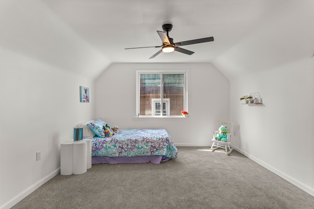 carpeted bedroom featuring lofted ceiling and ceiling fan