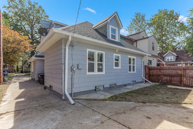 rear view of house with a patio