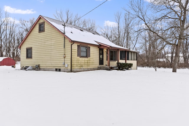 view of snow covered property