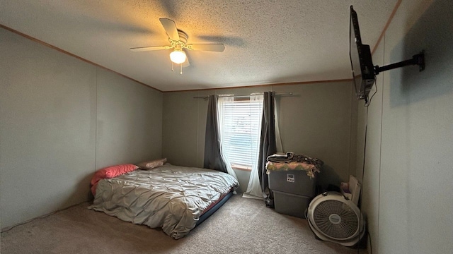 bedroom featuring lofted ceiling, ornamental molding, ceiling fan, a textured ceiling, and light carpet