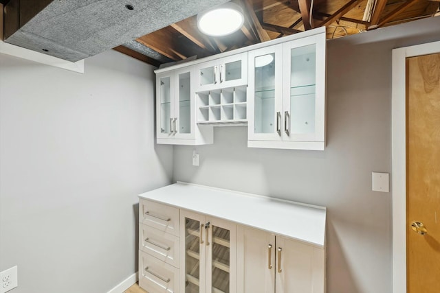 interior space with white cabinetry