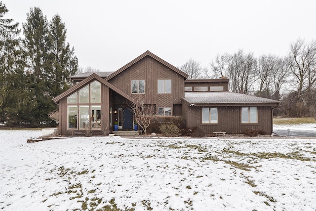 view of snow covered property