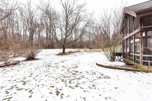 view of snowy yard