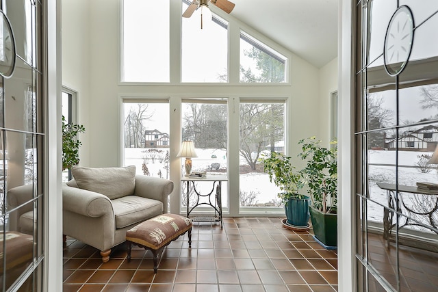 sunroom / solarium with ceiling fan