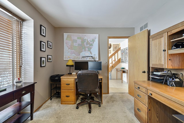 view of carpeted office space