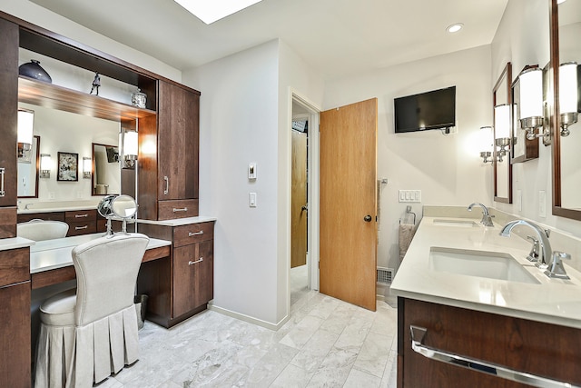 bathroom featuring vanity