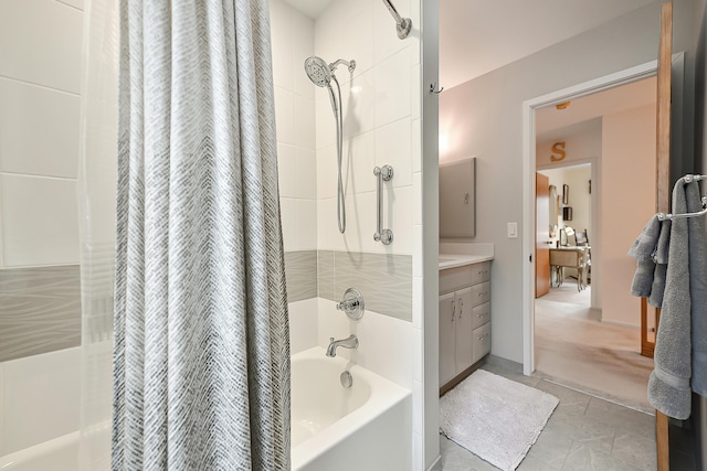 bathroom with tile patterned flooring, vanity, and shower / bath combo with shower curtain