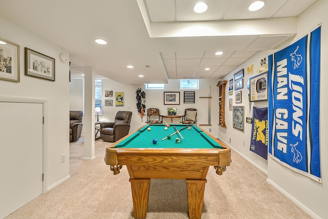 game room featuring pool table, a paneled ceiling, and light carpet