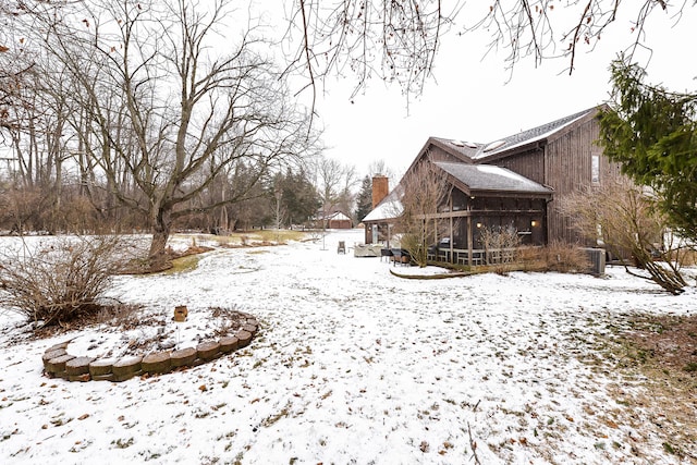 view of snowy yard