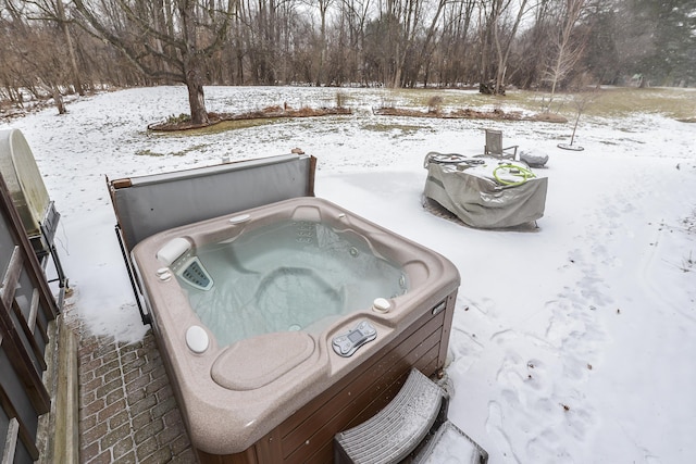 exterior details featuring a hot tub