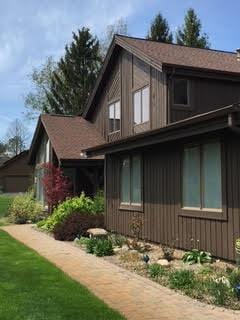 view of home's exterior featuring a yard