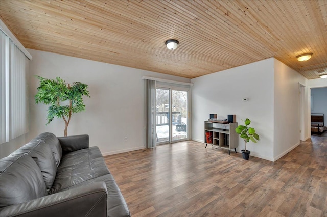 living room featuring wood ceiling and wood-type flooring