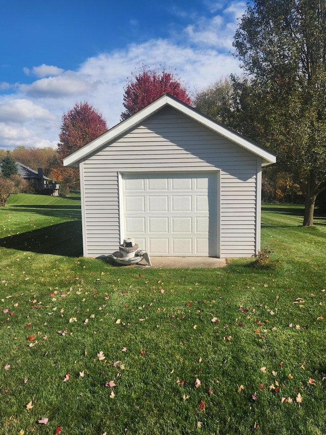 garage with a lawn