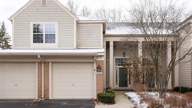 view of front of home with a garage