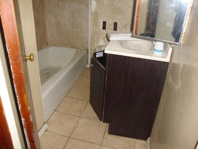 bathroom featuring shower / tub combination, vanity, and tile patterned flooring