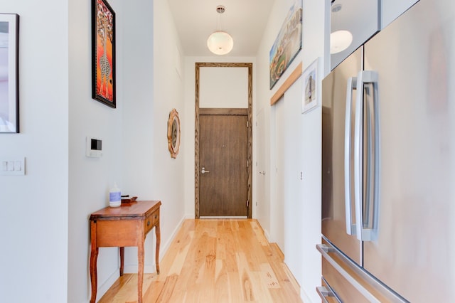 doorway to outside featuring hardwood / wood-style floors