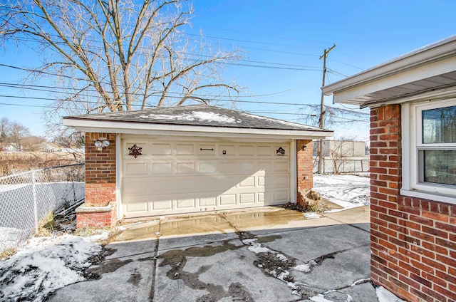 view of snow covered garage