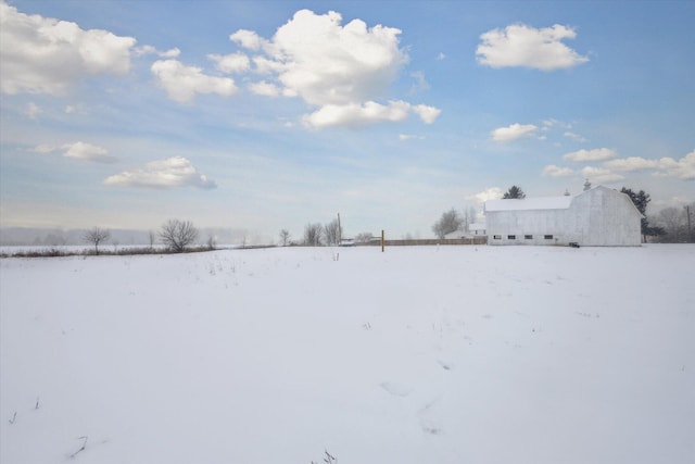 view of yard covered in snow