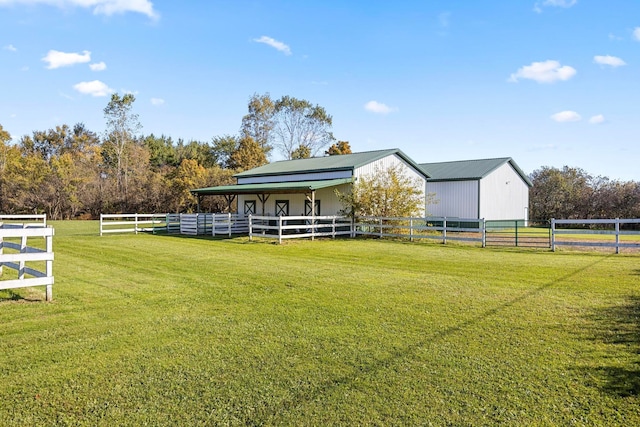 exterior space featuring an outbuilding and a rural view