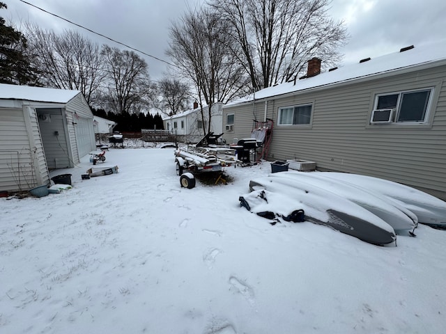 view of yard covered in snow