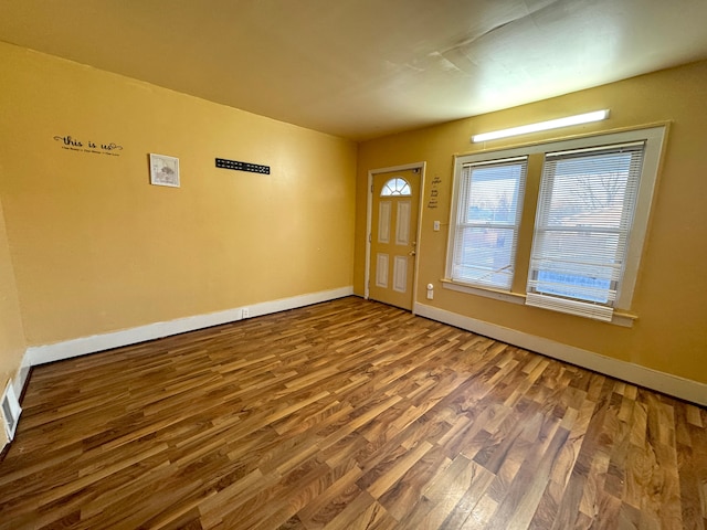 foyer entrance featuring hardwood / wood-style floors