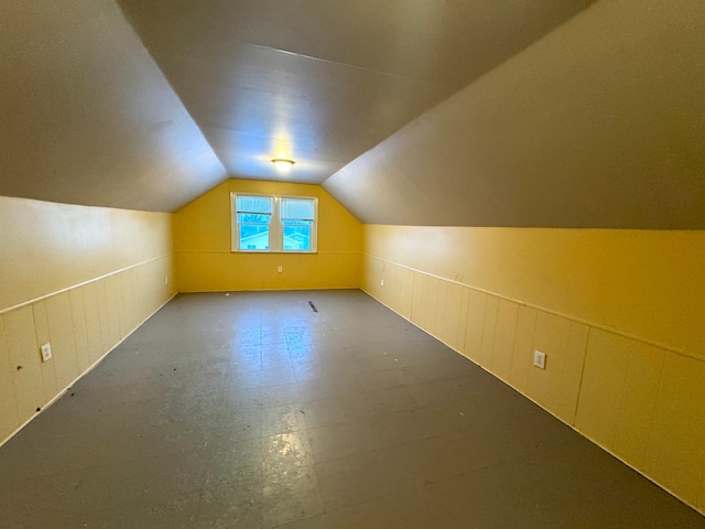 additional living space with lofted ceiling