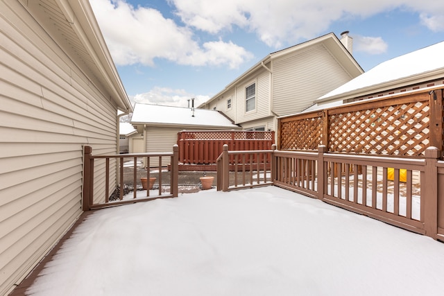 view of snow covered deck