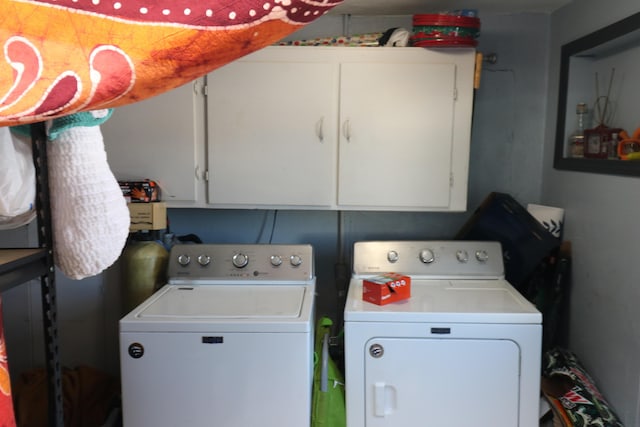 202 Fifth St, Jackson, MI 49203 - laundry room with cabinets and separate washer and dryer
