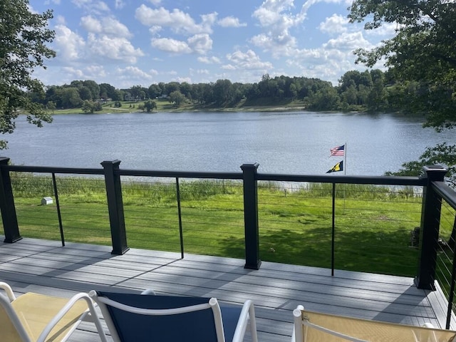 balcony featuring a water view