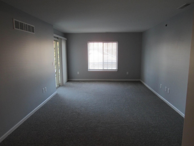 empty room featuring carpet flooring