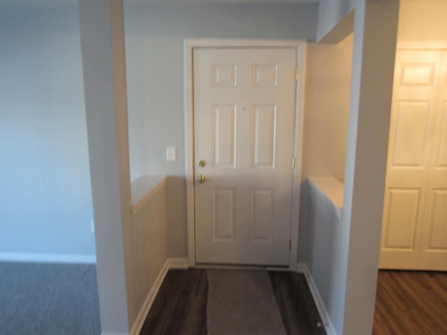 doorway to outside featuring dark hardwood / wood-style floors