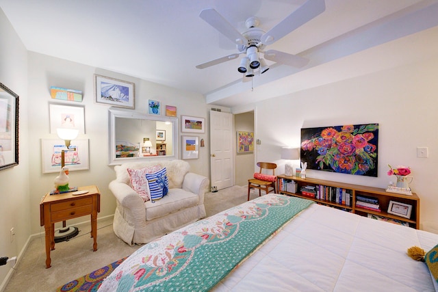 bedroom featuring light carpet and ceiling fan