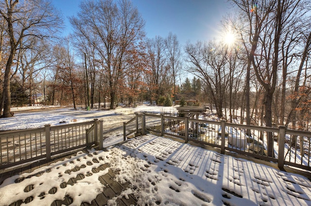 view of snow covered deck