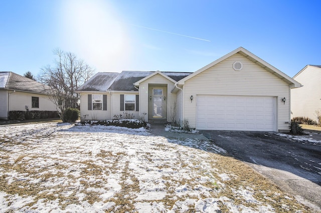 single story home with a garage