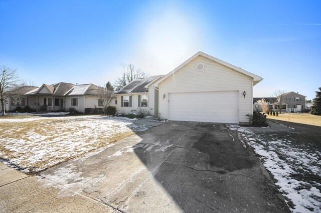 single story home with a garage